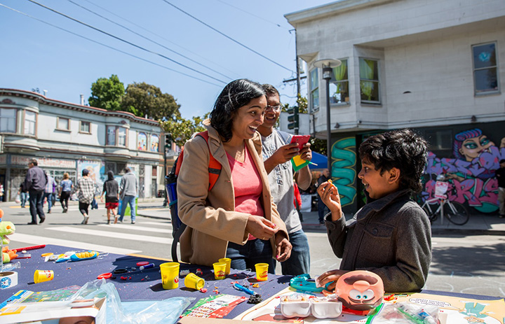 shoppers in outdoor market in San Francisco